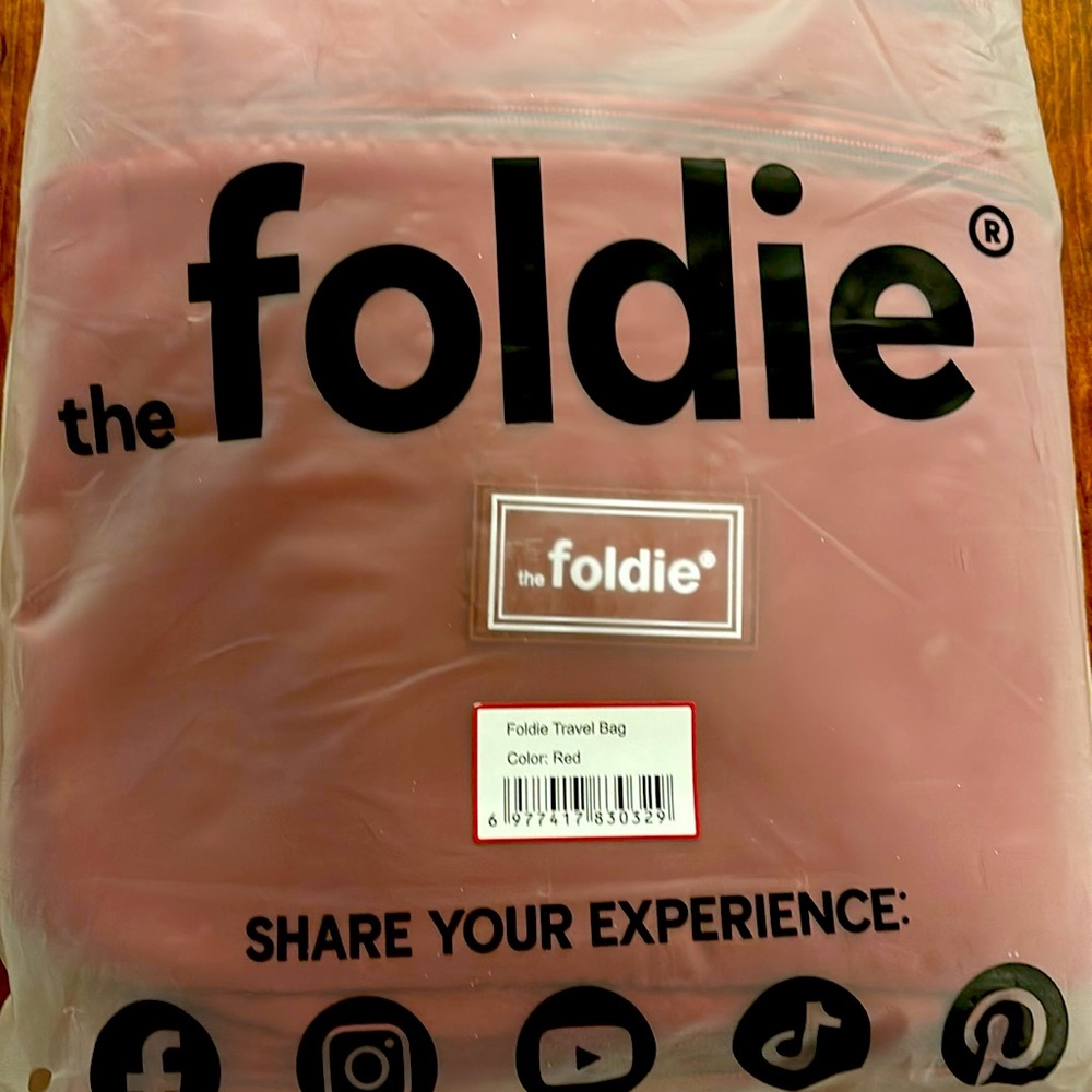 Foldie Travel Bag. “The perfect travel bag!” Color Red